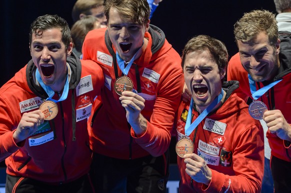 Third placed Switzerland&#039;s Fabian Kauter, Peer Borsky, Max Heinzer and Benjamin Steffen, from left, pose with the bronze medal on the podium after the men&#039;s team epee final at the European F ...