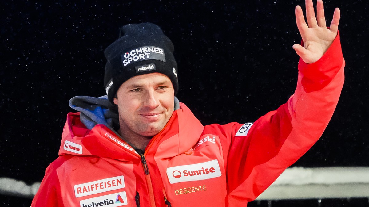 Beat Feuz of Switzerland reacts during the bib draw for the men's downhill race at the Alpine Skiing FIS Ski World Cup in Kitzbuehel, Austria, Friday, January 20, 2023. (KEYSTONE/Jean-Christophe  ...