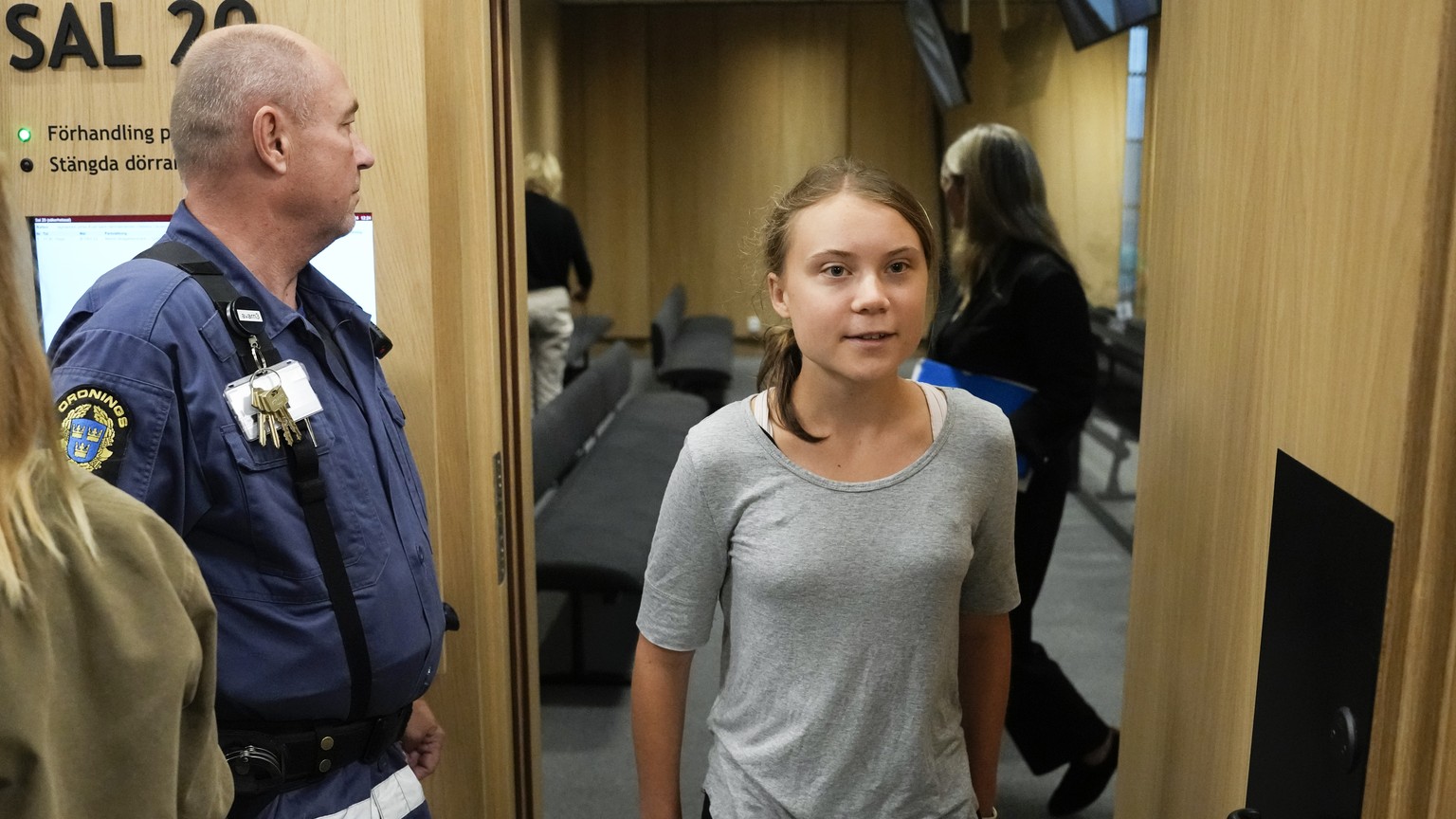 Climate activist Greta Thunberg of Sweden leaves a court room after a hearing in Malmo, Sweden, Monday, July 24, 2023. Climate activist Greta Thunberg appears in court on Monday charged with disobeyin ...