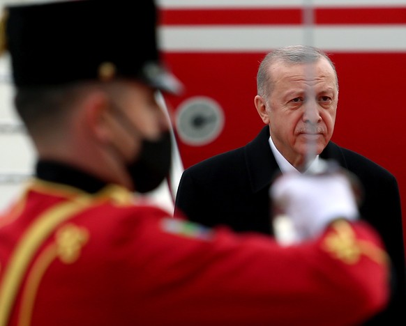 epa09691053 Turkish President Recep Tayyip Erdogan during a welcoming ceremony upon his arrival at Tirana International Airport &#039;Mother Teresa&#039;, in Tirana, Albania, 17 January 2022. Erdogan  ...