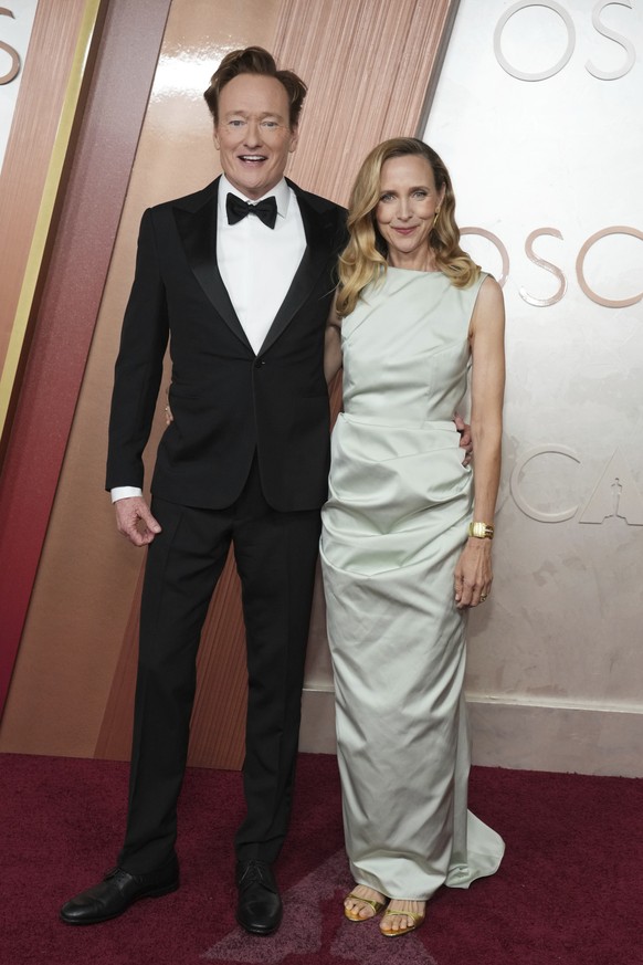 Conan O&#039;Brien, left, and Liza Powel O&#039;Brien arrive at the Oscars on Sunday, March 2, 2025, at the Dolby Theatre in Los Angeles. (Photo by Jordan Strauss/Invision/AP)
Conan O&#039;Brien,Liza  ...