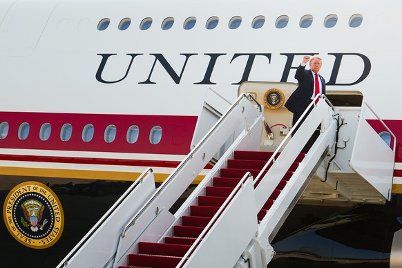 President Donald Trump raises his fist while boarding the new Air Force One, Wednesday, July 1, 2026, at Joint Base Andrews, Md. (AP Photo/Julia Demaree Nikhinson)
Trump Air Force One