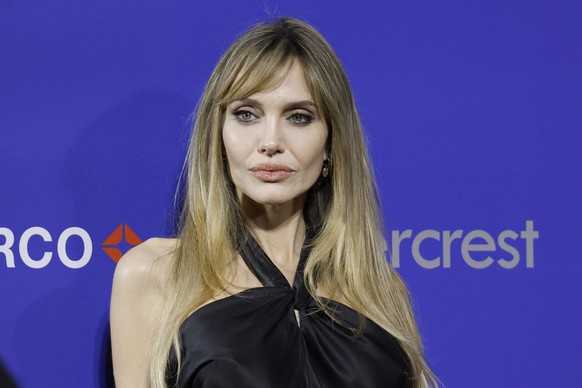 epa11804629 Angelina Jolie poses on the red carpet at the 2025 Palm Springs International Film Festival Awards Night Gala at the Palm Springs Convention Center in Palm Springs, California, USA, 03 Jan ...