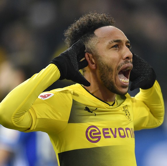 Dortmund&#039;s Pierre-Emerick Aubameyang celebrates scoring the opening goal during the German Bundesliga soccer match between Borussia Dortmund and FC Schalke 04 in Dortmund, Germany, Saturday, Nov. ...