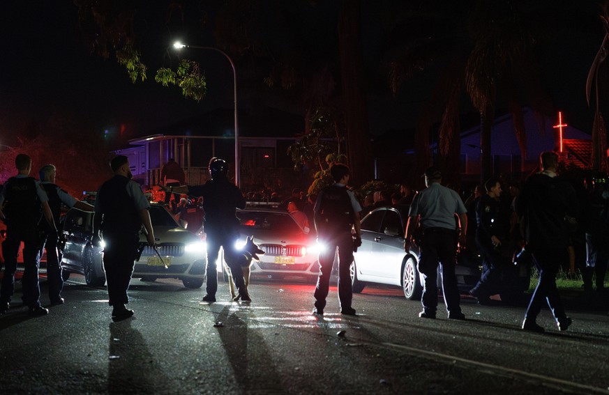 epa11280344 Police guard the area following a stabbing at Christ The Good Shepherd Church in the suburb of Wakeley in Sydney, Australia, 15 April 2024. A Christian bishop and three churchgoers have be ...