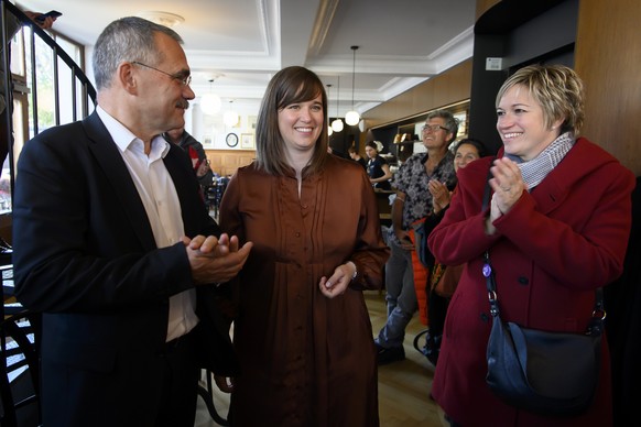 Les candidat-e-s au Conseil d&#039;Etat fribourgeois Jean-Fran�ois Steiert, Parti socialiste, Alizee Rey, Parti socialiste, et Valerie Piller Carrard, Parti socialiste, de gauche a droite, applaudisse ...