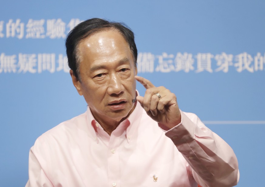 FILE - Chief Executive Officer of Hon Hai Precision Industry (Foxconn) Terry Gou answers to audience members during a media event announcing his new book &#039;&#039;30 memos written by Father Guo to  ...