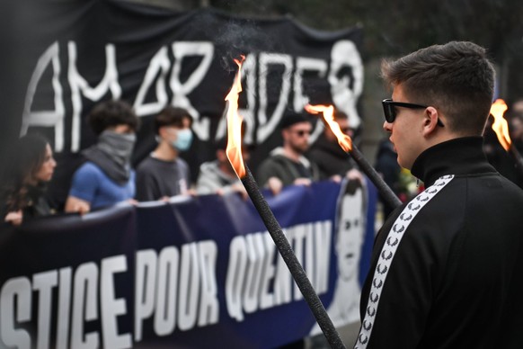 epa12765622 Activists gather near Place Jean Jaures in Lyon, France, 21 February 2026, during a march in tribute to late far-right sympathiser Quentin Debranque. 23-year-old student Quentin Debranque  ...