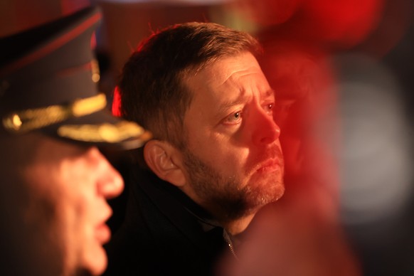 epa11040058 Interior Minister Vit Rakusan (C) and Police Chairman Martin Vondrasek (L) address the press near the scene of a shooting at Charles University in central Prague, December 21, 2023. Accord ...