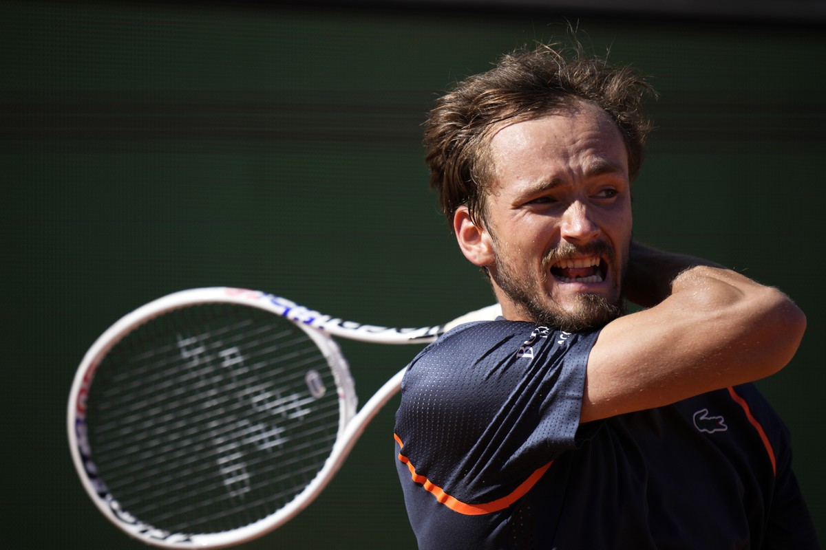 Daniil Medvedev, of Russia, hits a forehand to Holger Rune, of Denmark, during their Monte Carlo Tennis Masters quarterfinals match in Monaco, Friday, April 14, 2023. (AP Photo/Daniel Cole)