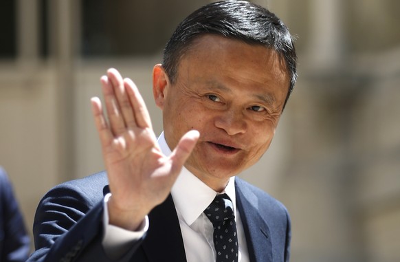 FILE - In this May 15, 2019 file photo, Alibaba group founder Jack Ma arrives for the Tech for Good summit in Paris.  As the coronavirus spreads, the world is changing
