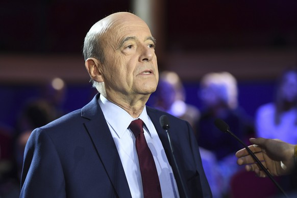 Candidates for France&#039;s upcoming presidential primary election French former prime minister Alain Juppe delivers a speech during a TV debate in Paris, Thursday, Nov. 3, 2016. The first round of t ...