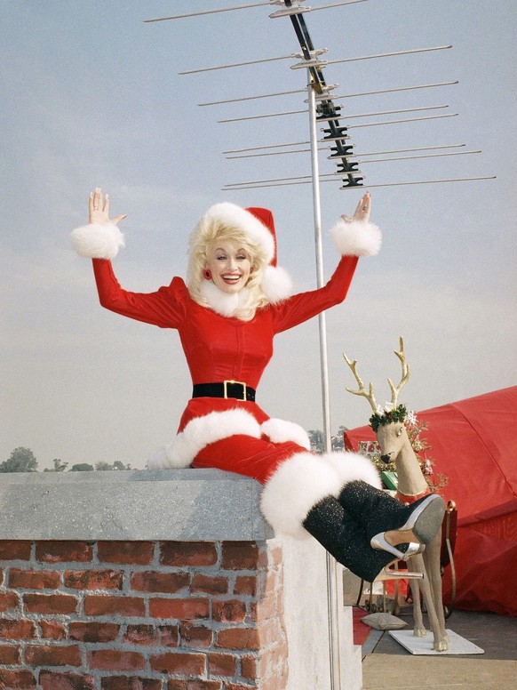 DOLLY PARTON in DOLLY (1987), directed by LOUIS J. HORVITZ. PUBLICATIONxNOTxINxGERxFRAxESP Copyright: xSandollarxProductionsx/xAlbumx alb5460514 EDITORIAL USE ONLY
