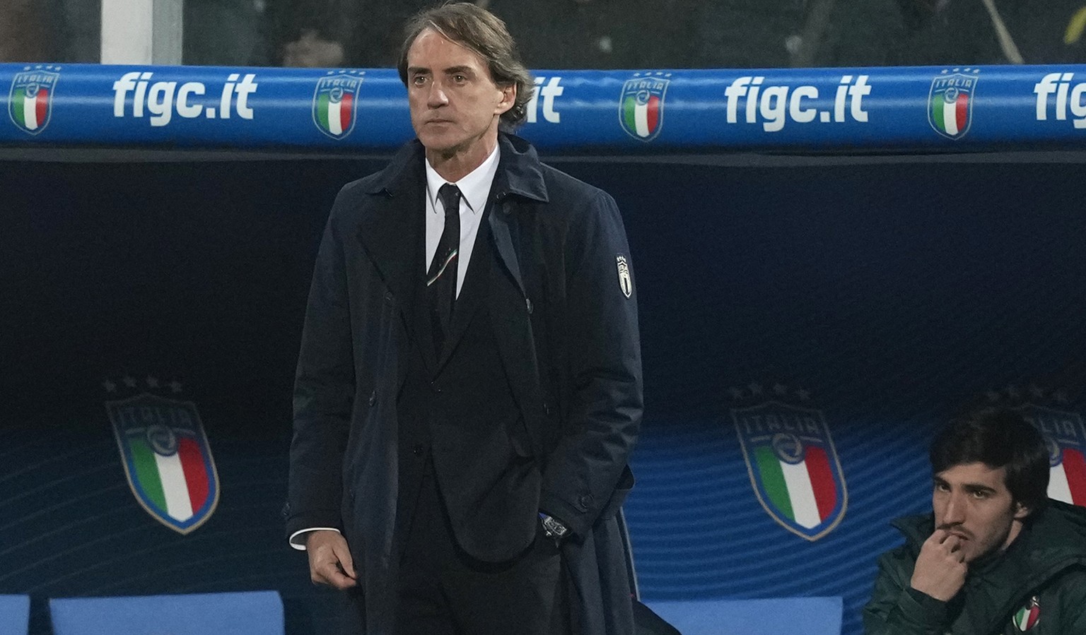 Italy&#039;s manager Roberto Mancini stands on the bench during the World Cup qualifying play-off soccer match between Italy and North Macedonia, at Renzo Barbera stadium, in Palermo, Italy, Thursday, ...