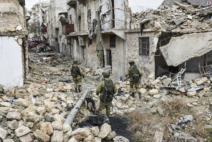 This undated handout photo released by the Russian Defense Ministry claims to show Russian Military engineers operating in Aleppo, Syria.(Russian Defense Ministry Press Service photo via AP)