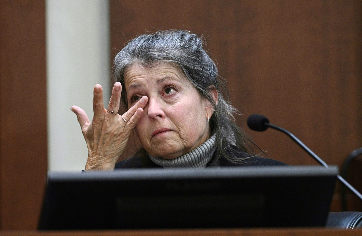 Christie Dembrowski, the older sister of Johnny Depp, testifies about their mother's death at the Fairfax County Circuit Court, April 12, 2022, in Fairfax, Va. A jury in Virginia is scheduled to  ...