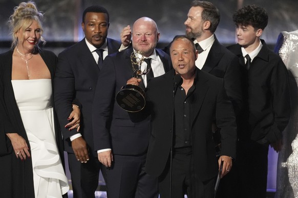 Stephen Graham, center, and the cast and crew of &quot;Adolescence&quot; accept the award for outstanding limited or anthology series during the 77th Primetime Emmy Awards on Sunday, Sept. 14, 2025, a ...