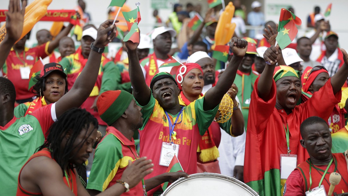 Burkina Faso soccer team fans chant ahead of the African Cup of Nations Group A soccer match between Gabon and Burkina Faso at the Stade de l'Amitie, in Libreville, Gabon on Wednesday Jan. 18, 20 ...