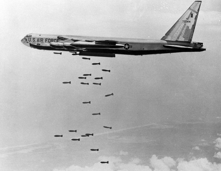A U.S. B-52 Stratofortress drops a load of 750-pound bombs over a Vietnam coastal area during the Vietnam War, Nov. 5, 1965. Boeing&#039;s B-52 bomber has never been used the way it was initially inte ...