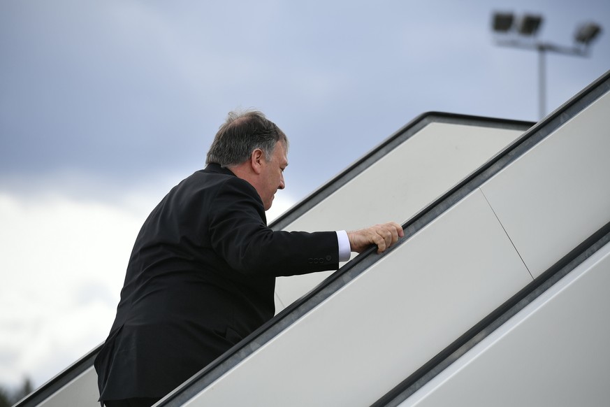 US Secretary of State Mike Pompeo boards a plane at Rovaniemi Airport in Rovaniemi, Finland, after taking part in the 11th Ministerial Meeting of the Arctic Council, Tuesday May 7, 2019. (Mandel Ngan/ ...