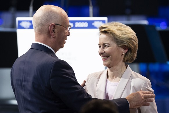 Klaus Schwab, Founder and Executive Chairman of the World Economic Forum, left, and Ursula von der Leyen, president of the European Commission, pictured during the welcoming address to the 50th annual meeting of the World Economic Forum, WEF, in Davos, Switzerland, Monday, January 20, 2020. The meeting brings together entrepreneurs, scientists, corporate and political leaders in Davos from January 21 to 24. (KEYSTONE/Gian Ehrenzeller)
