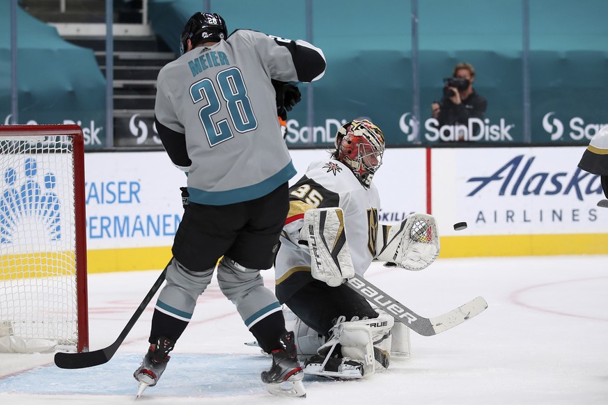 Vegas Golden Knights goaltender Oscar Dansk (35) makes a save against San Jose Sharks right wing Timo Meier (28) during the second period of an NHL hockey game in San Jose, Calif., Friday, March 5, 20 ...