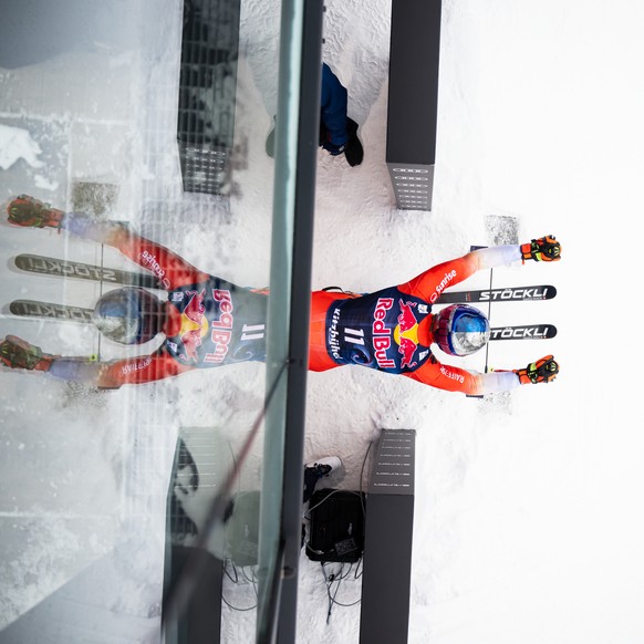 epa10411128 Marco Odermatt of Switzerland prepares for the start during a training session for the Men&#039;s Downhill race at the FIS Alpine Skiing World Cup in Kitzbuehel, Austria, 17 January 2023.  ...