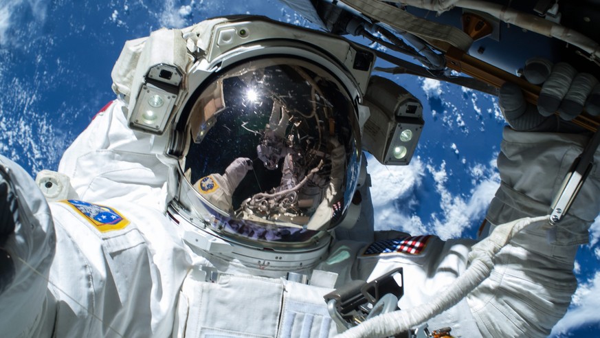 epa04636092 A handout picture made available by NASA on 25 February 2015 shows US NASA astronaut Barry Wilmore operating outside the International Space Station (ISS) on the first of three spacewalks  ...