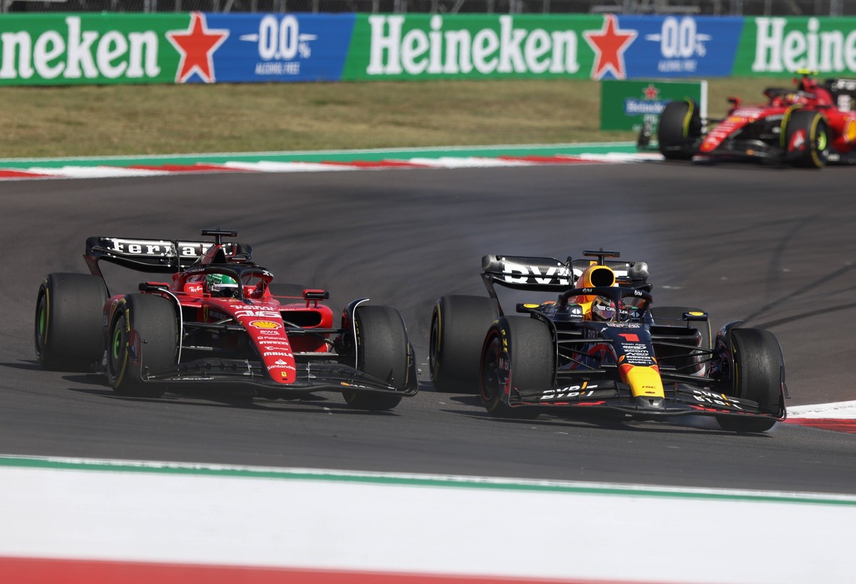 TX: Formula 1 USA Grand Prix 2023 Ferrari driver Charles Leclerc 16 gets passed by Red Bull driver Max Verstappen 1 during in the Formula 1 Lenovo United States Grand Prix at Circuit of the Americas i ...