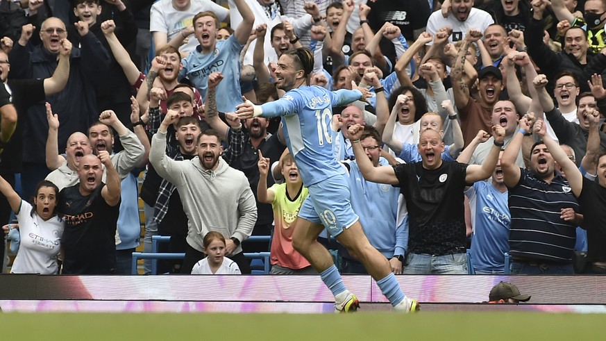 Manchester City&#039;s Jack Grealish celebrates after scoring his side&#039;s second goal during the English Premier League soccer match between Manchester City and Norwich City at Etihad stadium in M ...