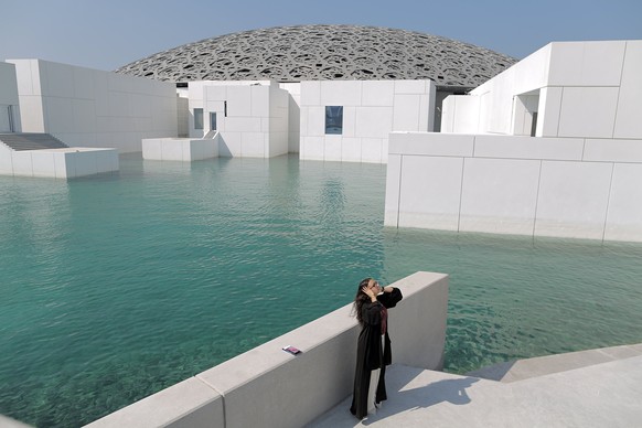 epa06322453 People visit the Louvre Abu Dhabi museum during its official public opening, in Abu Dhabi, UAE, 11 November 2017. EPA/MAHMOUD KHALED