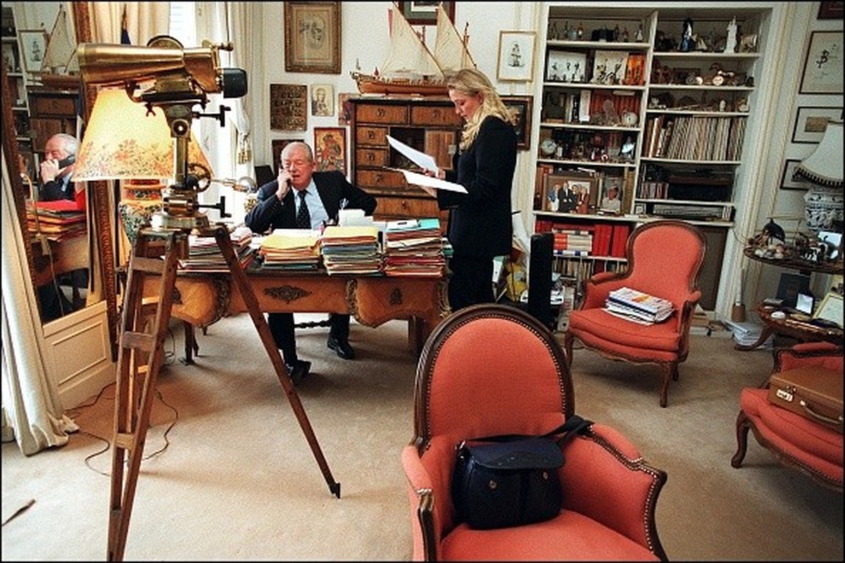 Marine in her father's office in Montretout, with her father Jean-Marie Le Pen in 2002. (Photo by Pierre-Olivier CALLEDE/Gamma-Rapho via Getty Images)