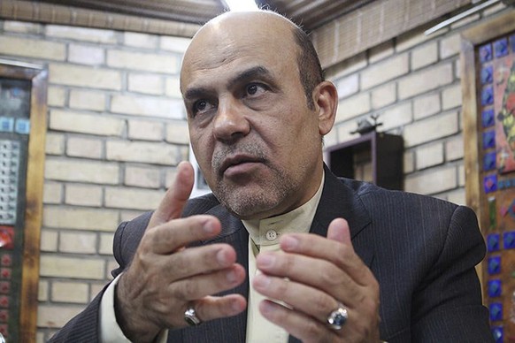 In this photo released by KhabarOnline News Agency on Wednesday, September 18, 2019, Ali Reza Akbari speaks in an interview, Iran.  Iran has sentenced Akbari, a former senior defense official, to death after…