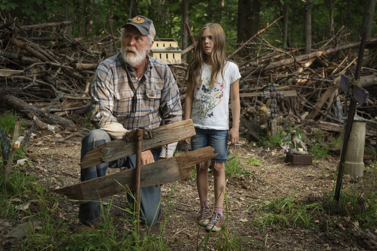 This image released by Paramount Pictures shows John Lithgow, left, and Jeté Laurence in a scene from "Pet Sematary." (Kerry Hayes/Paramount Pictures via AP)