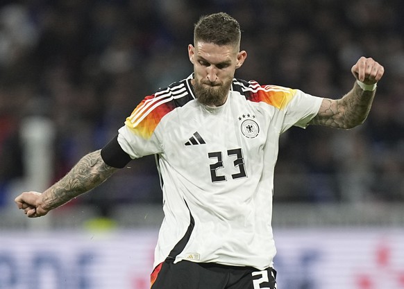 Germany's Robert Andrich in action during an international friendly soccer match between France and Germany at the Groupama stadium in Decines, near Lyon, central France, Saturday, March 23, 2024 ...