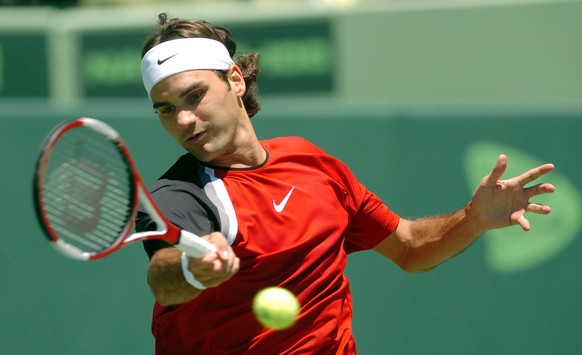 Roger Federer of Switzerland celebrates a point during his match against Andre Agassi of the USA during their semifinal match at the Nasdaq-100 Open in Key Biscayne, Florida Friday 01 April 2005. Fede ...