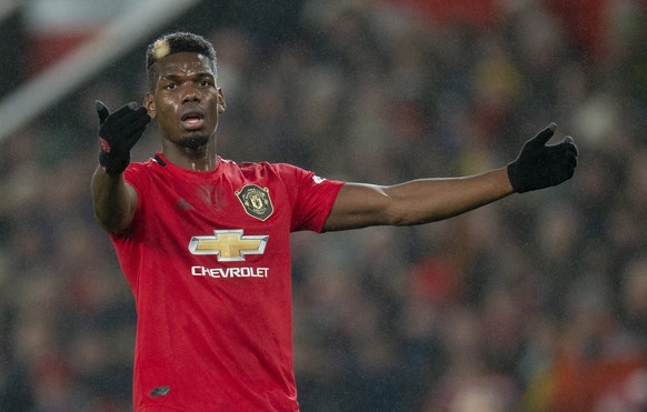 epa08091198 Manchester United&#039;s Paul Pogba in action during the English Premier League soccer match between Manchester United and Newcastle United at Old Trafford, Manchester, Britain, 26 Decembe ...