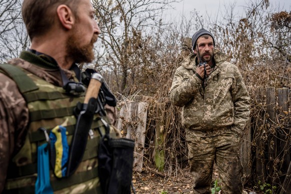 November 4, 2022, Terny, Ukraine: A soldier communicates through a walkie-talkie about potential injuries in the area. Ukrainian troops continue their counteroffensive operation in eastern Ukraine but ...