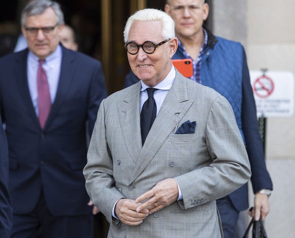 epa07436592 Roger Stone (C), a longtime political advisor to US President Donald J. Trump, departs after a hearing at the DC Federal District Court in Washington, DC, USA, 14 March 2019. Special Couns ...