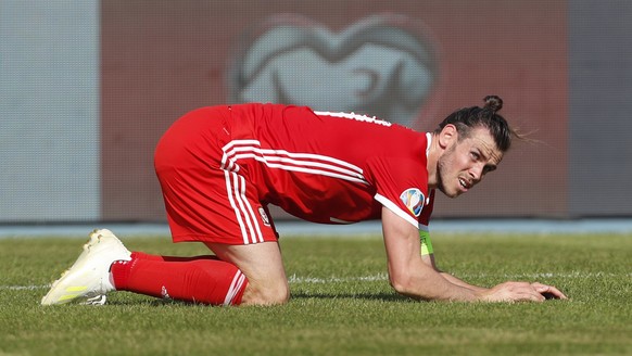 Wales forward Gareth Bale reacts after a missed chance during the Euro 2020 group E qualifying soccer match between Croatia and Wales at the Gradski Vrt stadium in Osijek, Croatia, Saturday, June 8, 2 ...