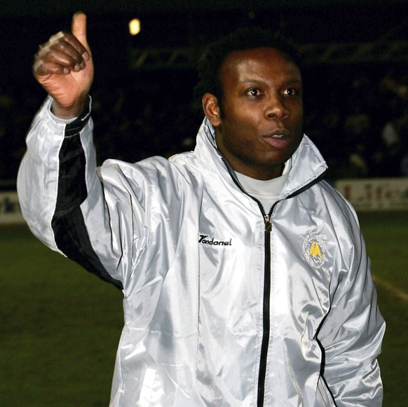 TORQUAY, UNITED KINGDOM - JANUARY 07: Torquay manager Leroy Rosenior waves triumphantly to the fans after the 0-0 draw in the FA Cup Third round game between Torquay United and Birmingham City on Janu ...