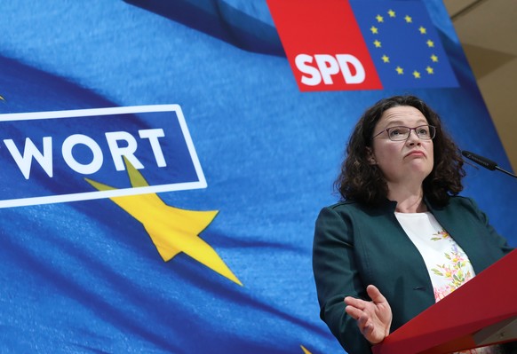 epa07603347 German Social Democratic Party (SPD) chairwoman and faction chair in the German parliament Bundestag Andrea Nahles speaks at the SPD headquarters Willy-Brandt-Haus in Berlin, Germany, 26 M ...