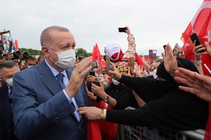 epa09303401 A handout photo made available by the Turkish President Press office shows Turkish President Recep Tayyip Erdogan attending the Istanbul Canal Bridge groundbreaking ceremony in Istanbul, T ...