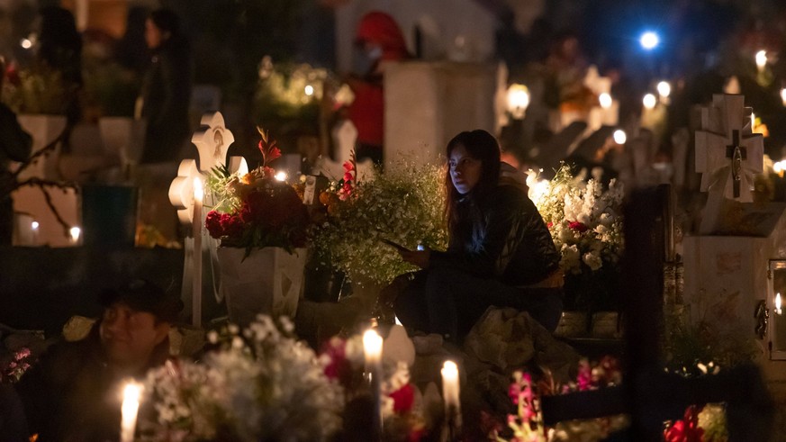 Candlemas In Cemeteries On The Day Of The Dead Thousands of families following the ancestral tradition of Day of the Dead, come to visit their deceased at night in the cemeteries of the Otomi communit ...