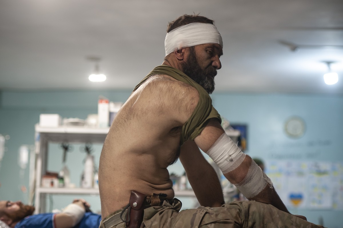 A Ukrainian wounded soldier at a medical stabilisation point near Bakhmut, Donetsk region, Ukraine, Sunday, May 14, 2023. (Iryna Rybakova via AP)
