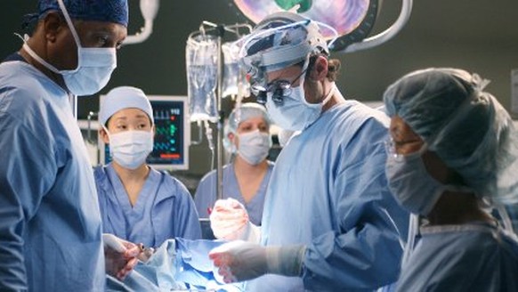 In this undated publicity photo released by ABC, actors James Pickens, Jr., left, Sandra Oh, center, and Patrick Dempsey, second from right, appear in this scene from the television series "Grey& ...