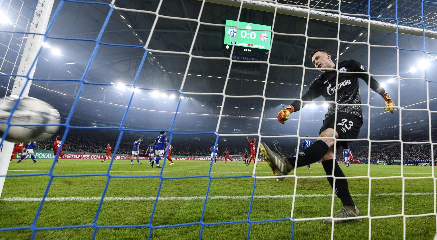 Schalke&#039;s goalkeeper Markus Schubert kicks the ball after he received the opening goal by Bayern&#039;s Joshua Kimmich during the German soccer cup, DFB Pokal, quarter-final match between FC Scha ...