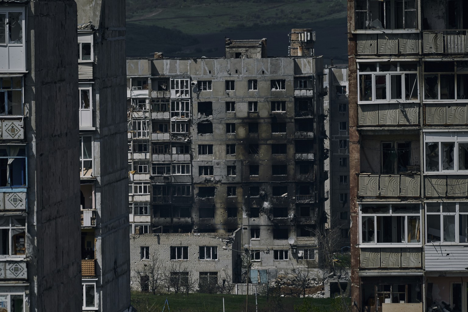 Burnt-out buildings in Bakhmut, Donetsk region, Ukraine, Wednesday, April 26, 2023. (AP Photo/Libkos)