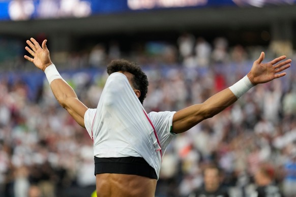Iran's Ramin Rezaeian (23) celebrates after scoring a goal during the World Cup Group G soccer match between Iran and New Zealand in Inglewood, Calif., near Los Angeles, Monday, June 15, 2026. (A ...