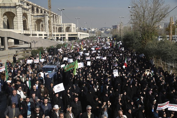 Iranian protesters chant slogans at a rally in Tehran, Iran, Saturday, Dec. 30, 2017. Iranian hard-liners rallied Saturday to support the country&#039;s supreme leader and clerically overseen governme ...